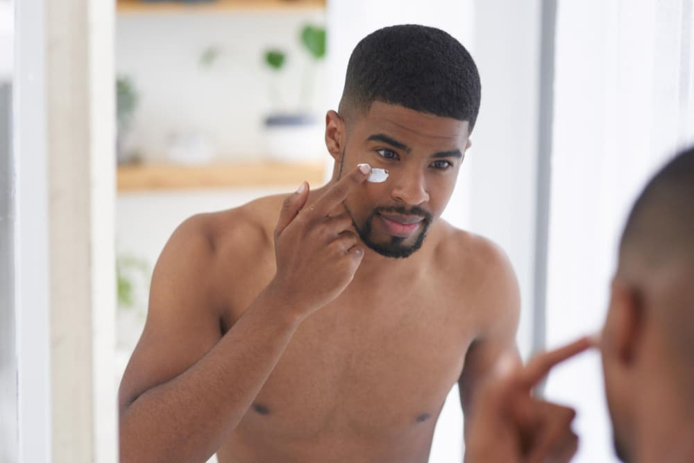 man using the best face wash for men